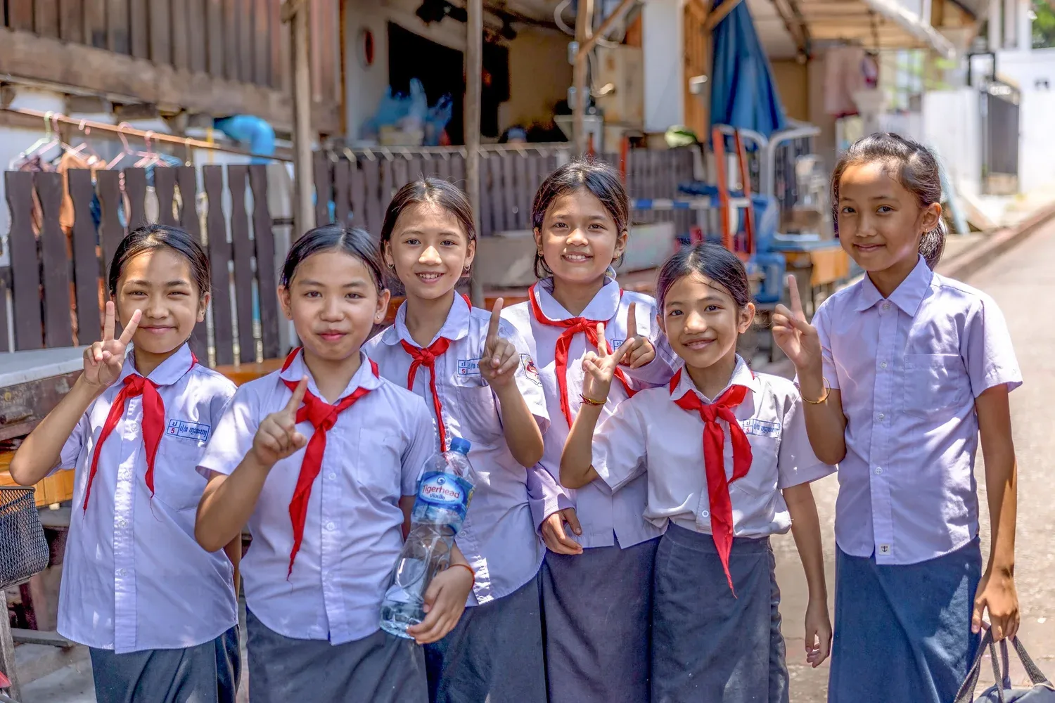 Schoolchildren walking in rural Laos