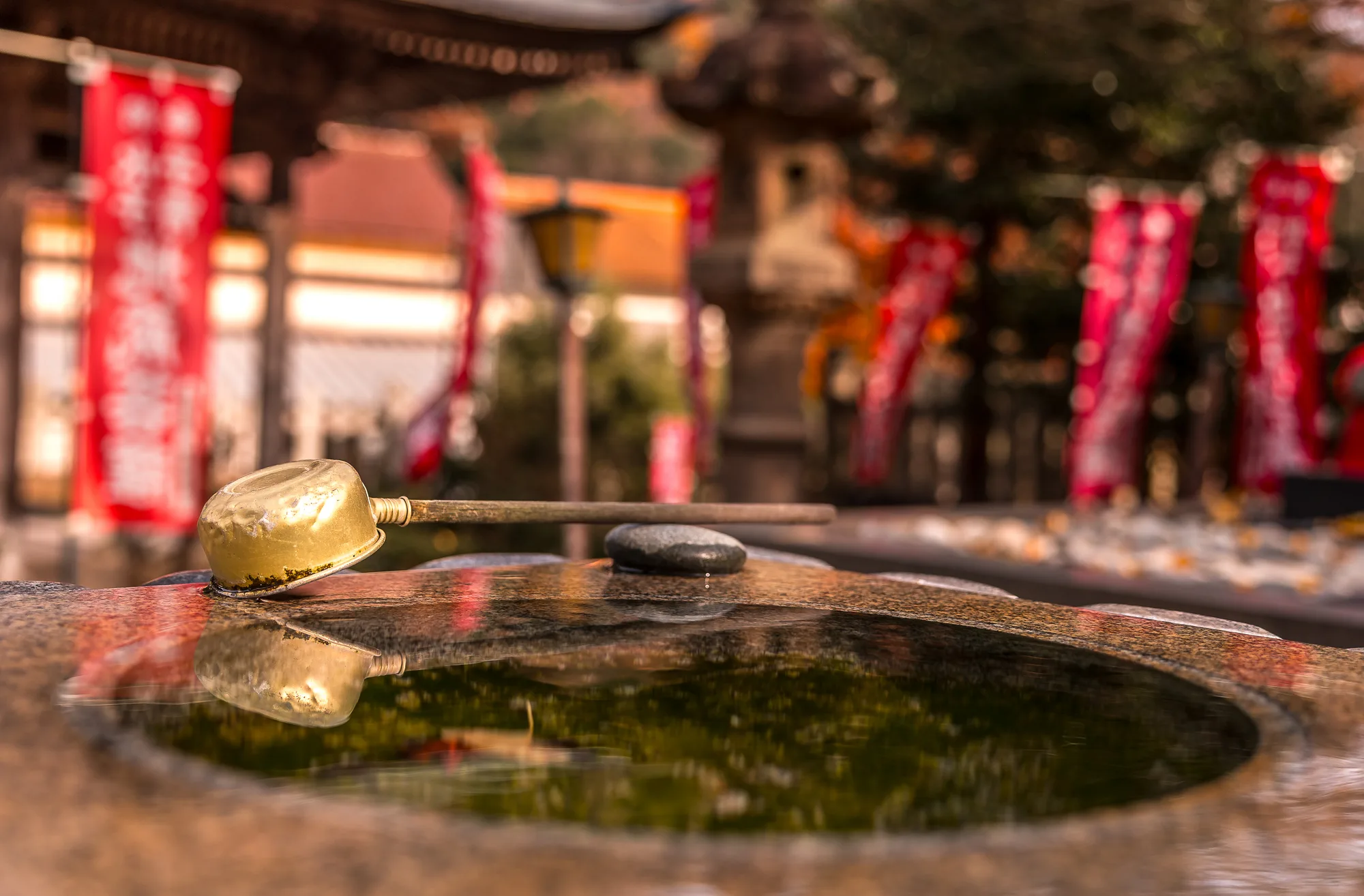 Traditional water ladle reflections