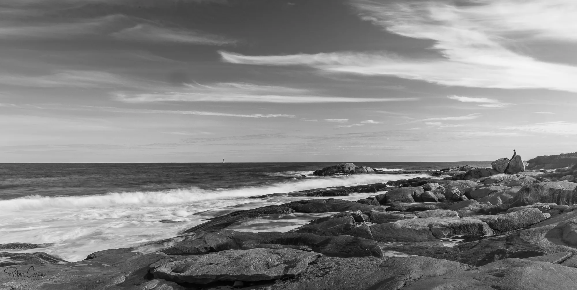 Dramatic ocean swell and surf in monochrome