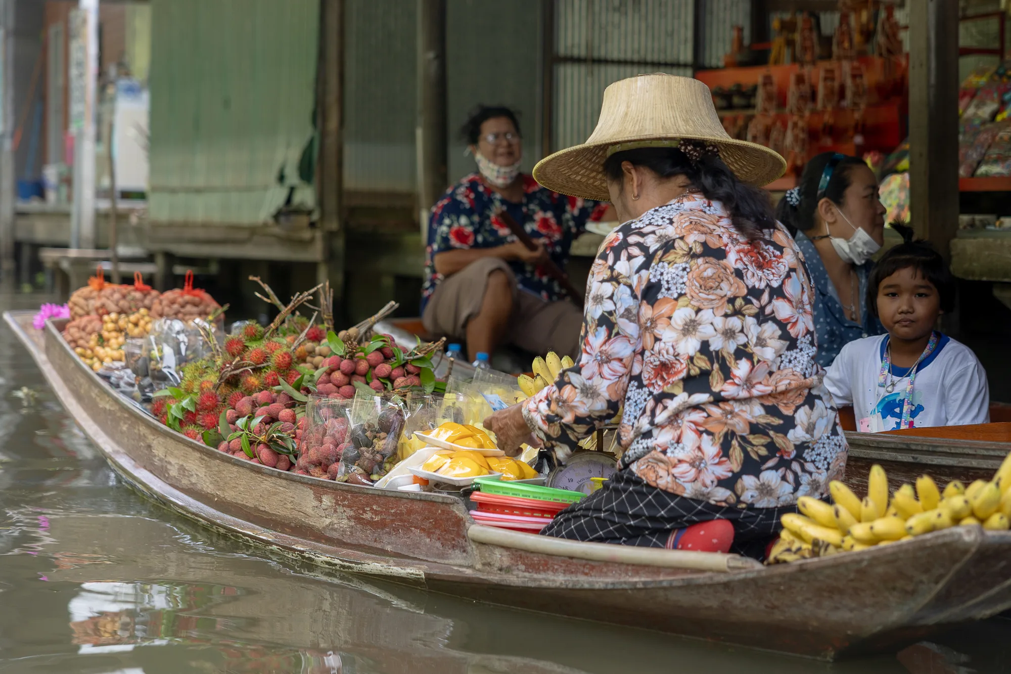 Vibrant boats and vendors at floating market